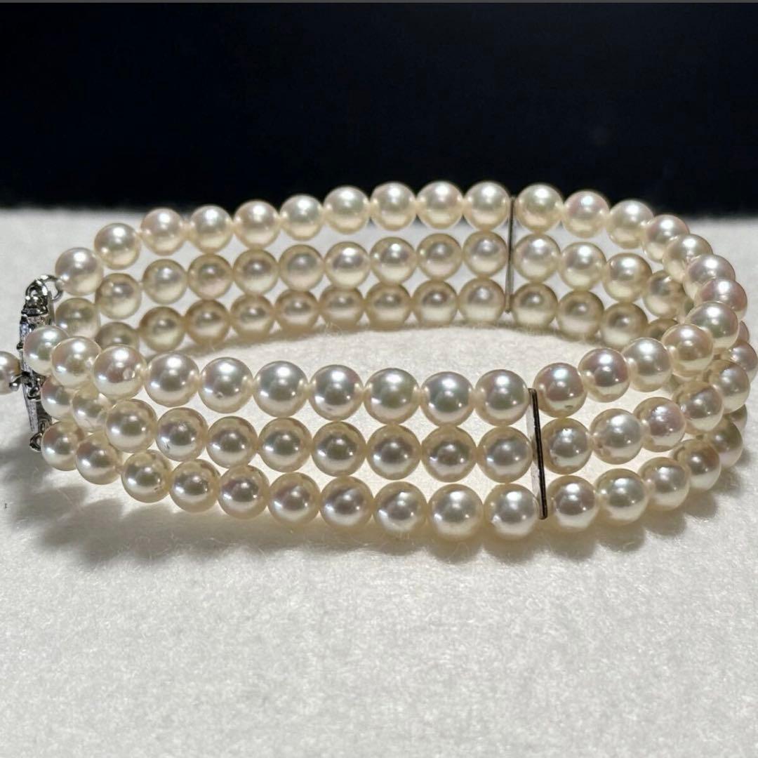 3-strand Akoya pearl bracelet with 5-5.5mm white to light pink pearls and silver clasp