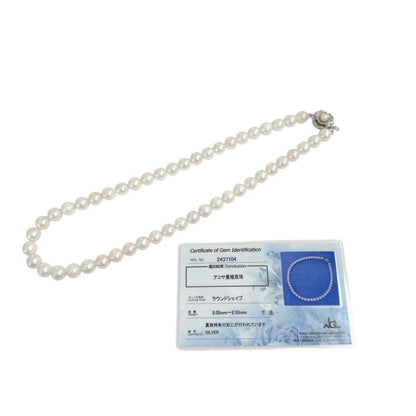 Close-up of an Akoya pearl necklace featuring 8-8.5mm white pearls on a 40cm strand