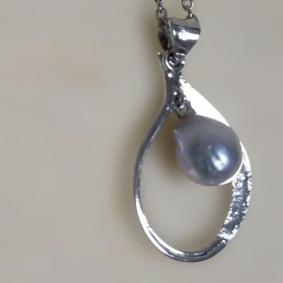 Mikimoto silver pendant necklace with a single 6mm pearl on a delicate chain