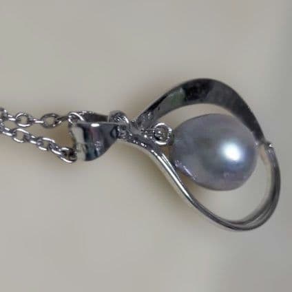 Mikimoto silver pendant necklace with a single 6mm pearl on a delicate chain