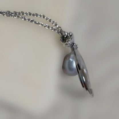 Mikimoto silver pendant necklace with a single 6mm pearl on a delicate chain