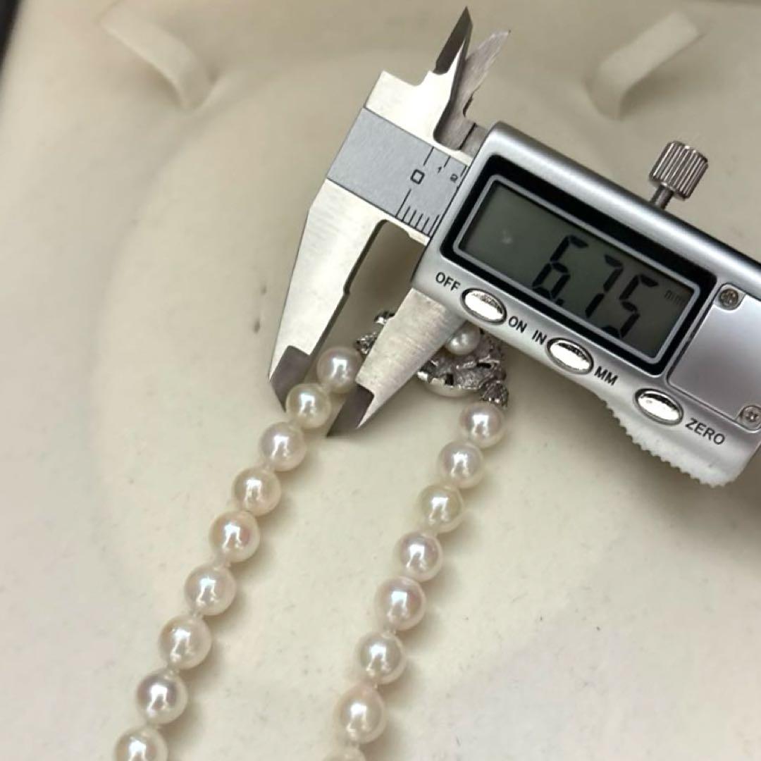Akoya pearl necklace with white pearls 6.5-7mm diameter, 42cm length, displayed on a white background