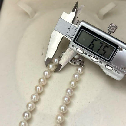 Akoya pearl necklace with white pearls 6.5-7mm diameter, 42cm length, displayed on a white background