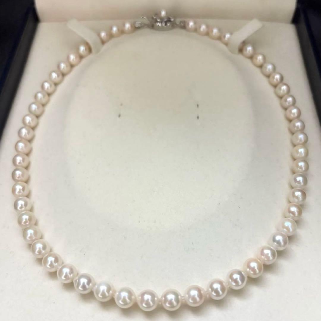 Akoya pearl necklace with white pearls 6.5-7mm diameter, 42cm length, displayed on a white background