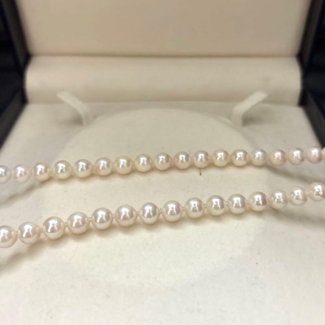 Akoya pearl necklace with white pearls 6.5-7mm diameter, 42cm length, displayed on a white background