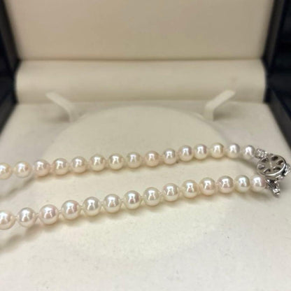 Akoya pearl necklace with white pearls 6.5-7mm diameter, 42cm length, displayed on a white background