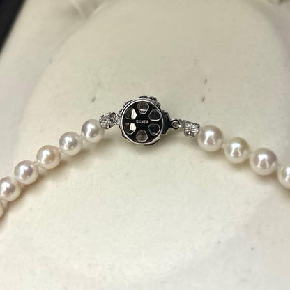 Akoya pearl necklace with white pearls 6.5-7mm diameter, 42cm length, displayed on a white background
