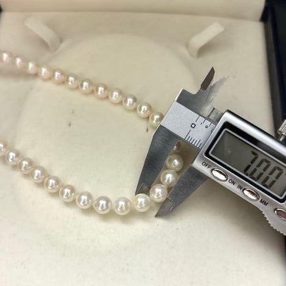 Akoya pearl necklace with white pearls 6.5-7mm diameter, 42cm length, displayed on a white background