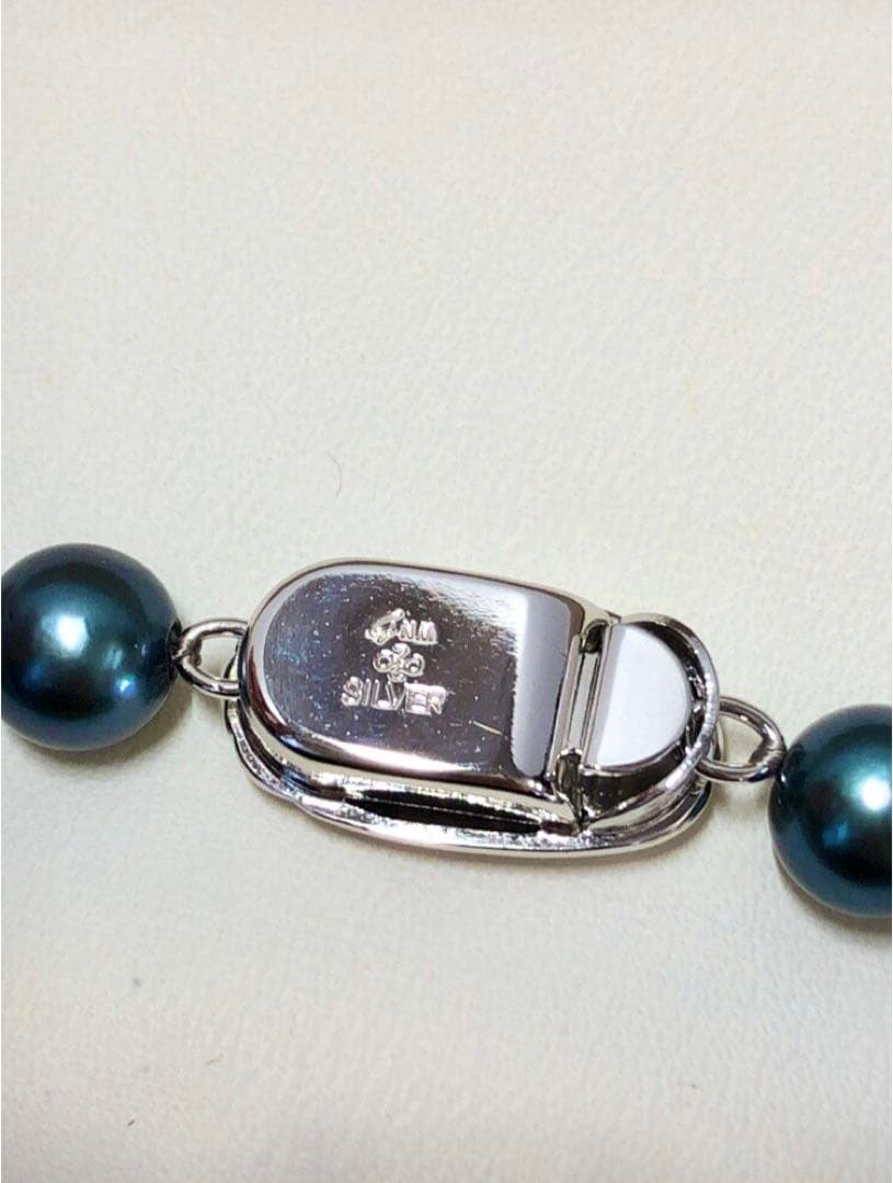 Akoya pearl necklace with blue-black semi-round pearls 7.0-7.5mm on silver clasp with Jewelry Maki stamp