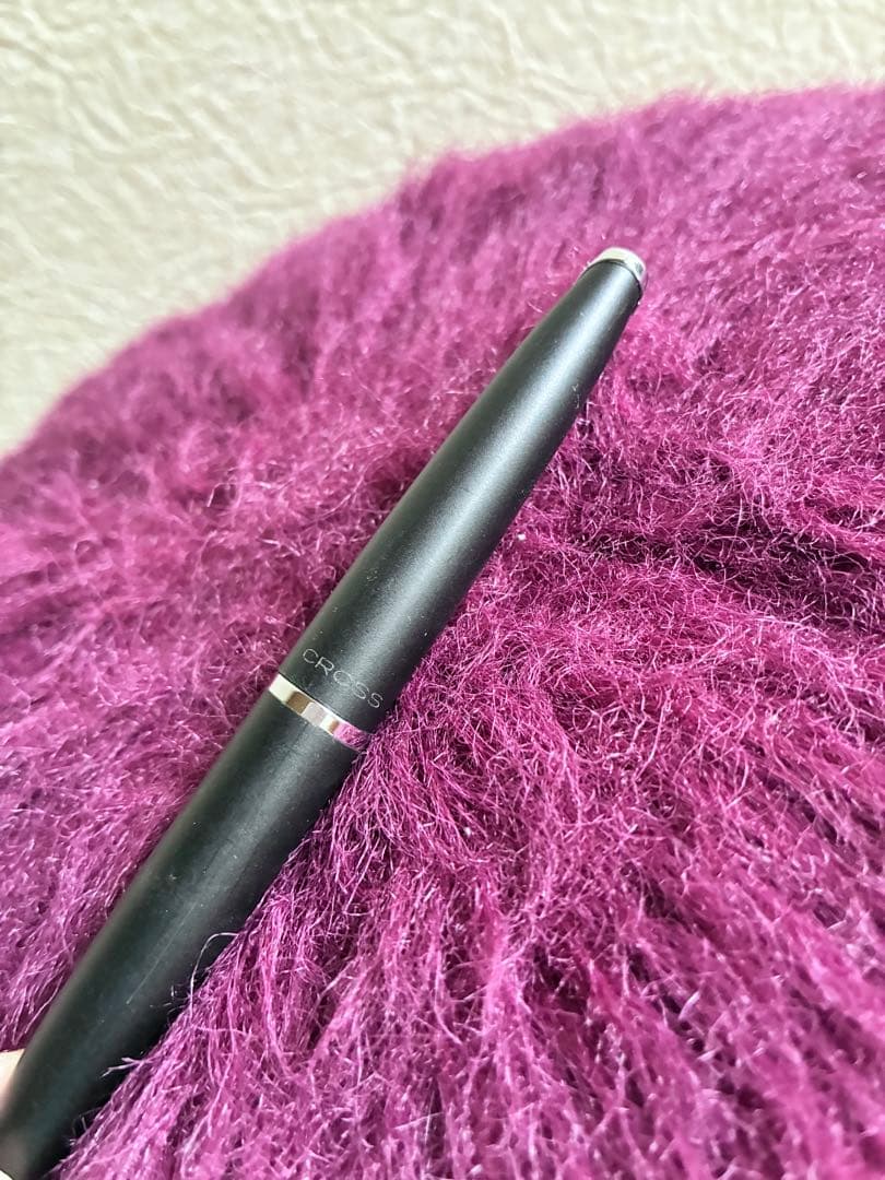 Cross black ballpoint pen with simple, sleek design shown against white background