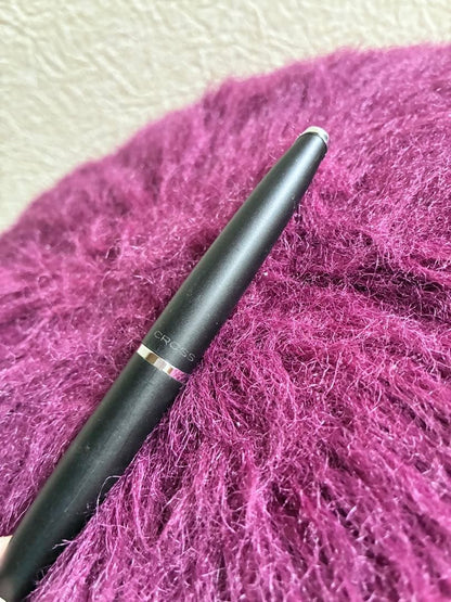 Cross black ballpoint pen with simple, sleek design shown against white background