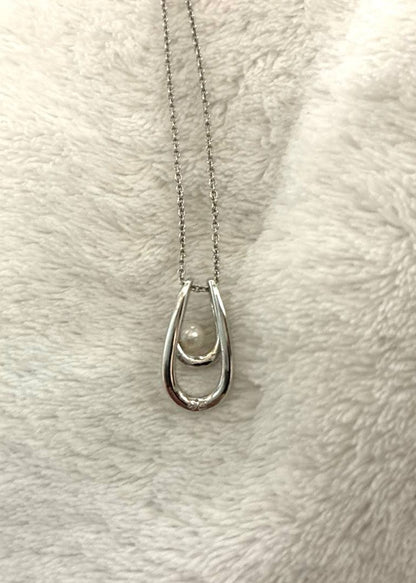 TASAKI silver necklace with a 1 pearl drop pendant and double loop chain, pendant size 1.85 cm by 1 cm