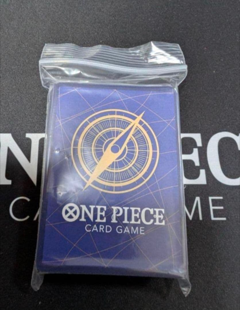 One Piece trading card game collection featuring various characters and sets from Japanese Bandai series