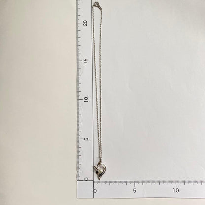 Akoya pearl necklace with a single 6.2mm pearl on a 40cm flowing curve silver chain