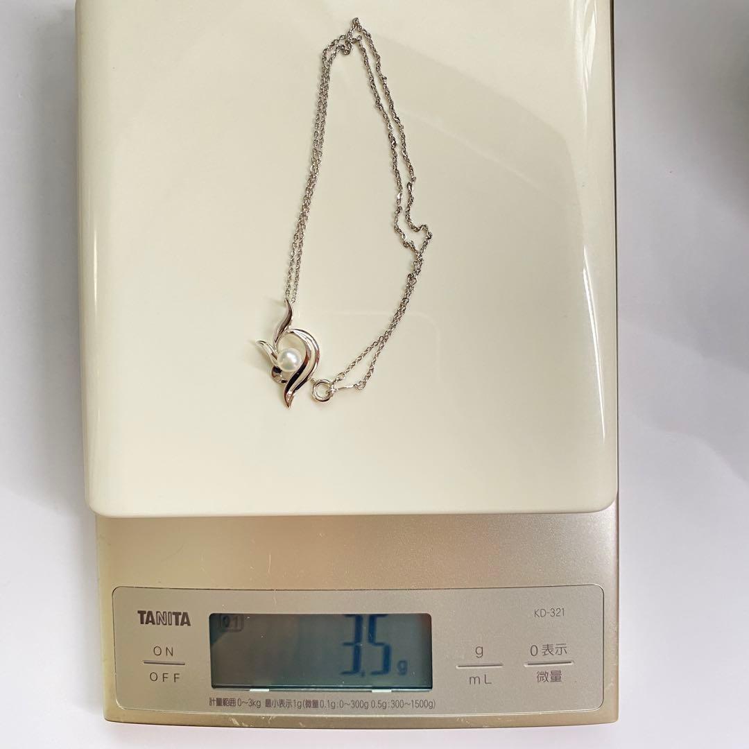 Akoya pearl necklace with a single 6.2mm pearl on a 40cm flowing curve silver chain