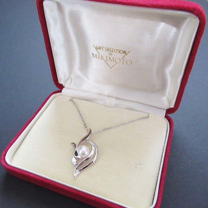 Akoya pearl necklace with a single 6.2mm pearl on a 40cm flowing curve silver chain