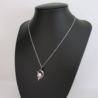Akoya pearl necklace with a single 6.2mm pearl on a 40cm flowing curve silver chain