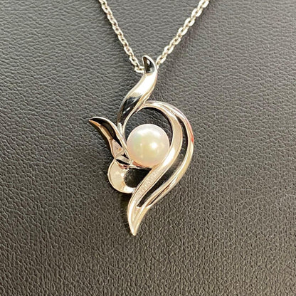 Akoya pearl necklace with a single 6.2mm pearl on a 40cm flowing curve silver chain