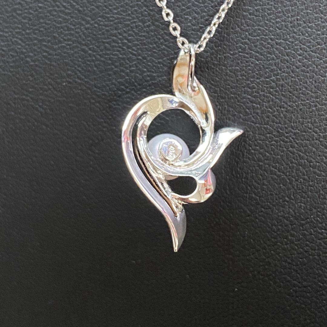 Akoya pearl necklace with a single 6.2mm pearl on a 40cm flowing curve silver chain