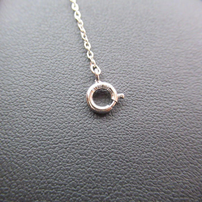 Akoya pearl necklace with a single 6.2mm pearl on a 40cm flowing curve silver chain