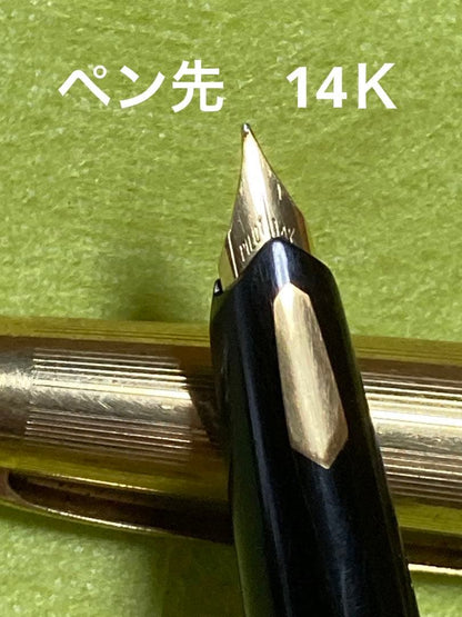 Pilot fountain pen with 14k gold nib in black and gold finish, 13.5 cm long