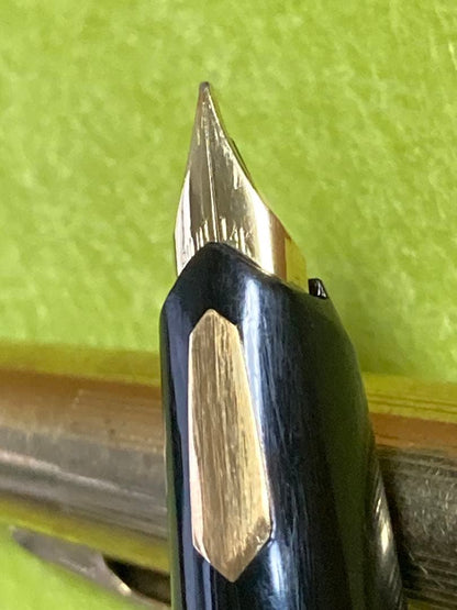 Pilot fountain pen with 14k gold nib in black and gold finish, 13.5 cm long