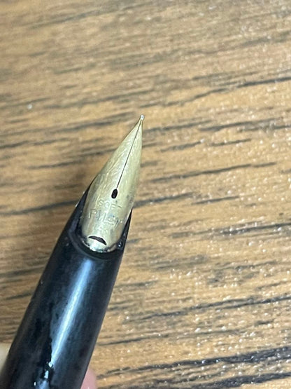 Pilot Fountain Pen E in black with gold trim featuring a soft inset nib