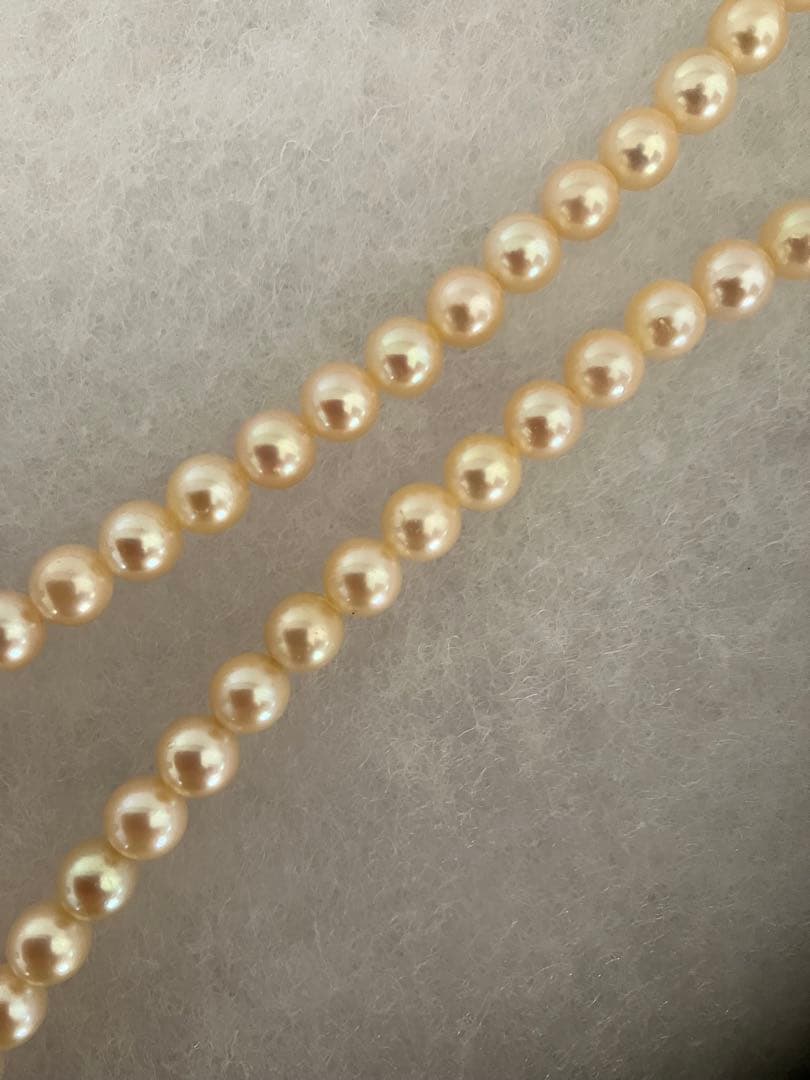 Akoya pearl necklace with 6.5-6.8mm pearls measuring 43.5 cm length on white background