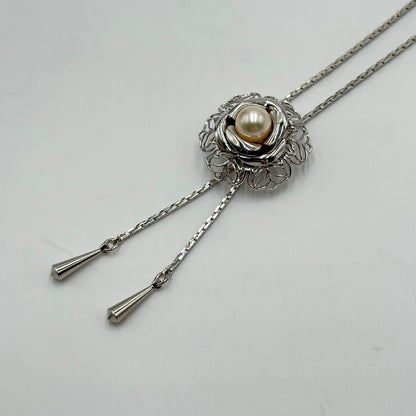 Akoya pearl loop tie necklace with 10mm pearls in silver tone featuring PAT stamp