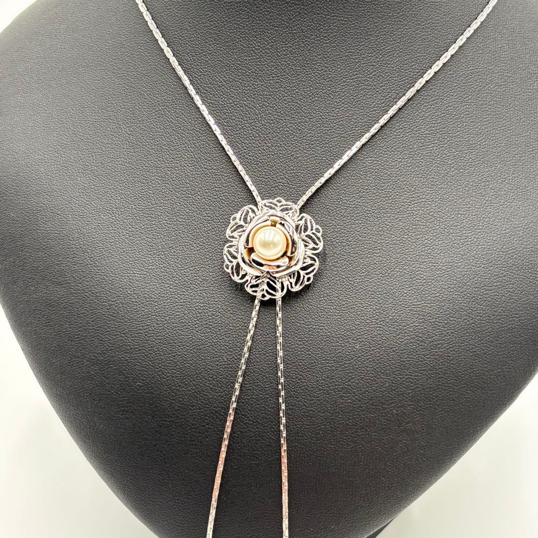 Akoya pearl loop tie necklace with 10mm pearls in silver tone featuring PAT stamp