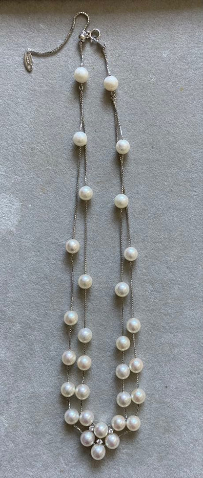 Tasaki K18 double strand necklace featuring 7-7.5mm pearls and diamond accents on a 39-45cm chain