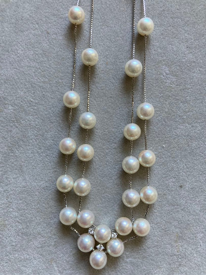 Tasaki K18 double strand necklace featuring 7-7.5mm pearls and diamond accents on a 39-45cm chain