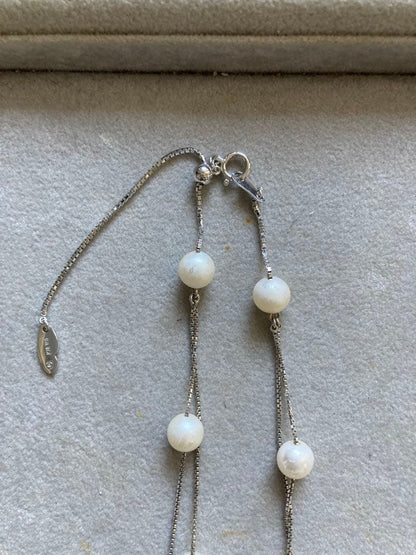Tasaki K18 double strand necklace featuring 7-7.5mm pearls and diamond accents on a 39-45cm chain