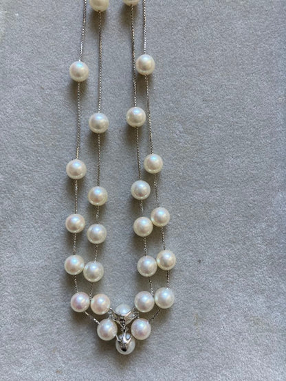 Tasaki K18 double strand necklace featuring 7-7.5mm pearls and diamond accents on a 39-45cm chain