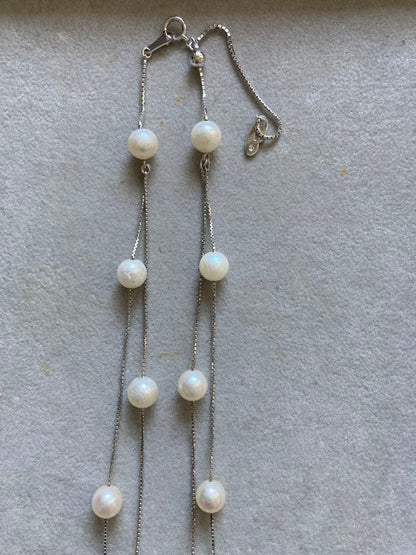 Tasaki K18 double strand necklace featuring 7-7.5mm pearls and diamond accents on a 39-45cm chain