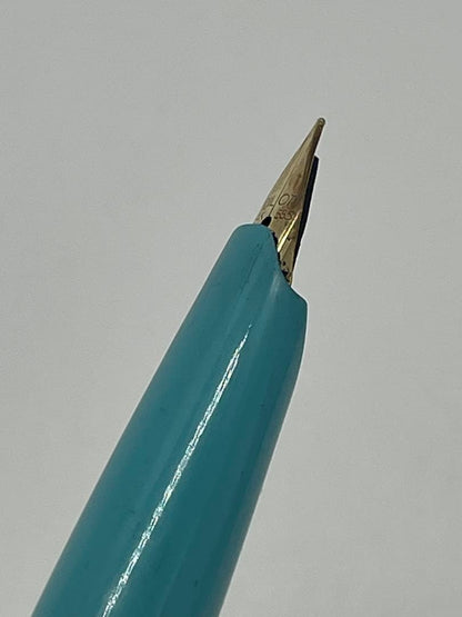 Pilot fountain pen with 14K gold-plated fine nib in turquoise blue and silver etching design