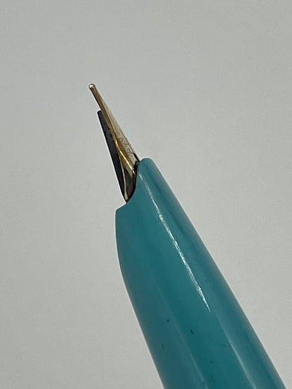Pilot fountain pen with 14K gold-plated fine nib in turquoise blue and silver etching design