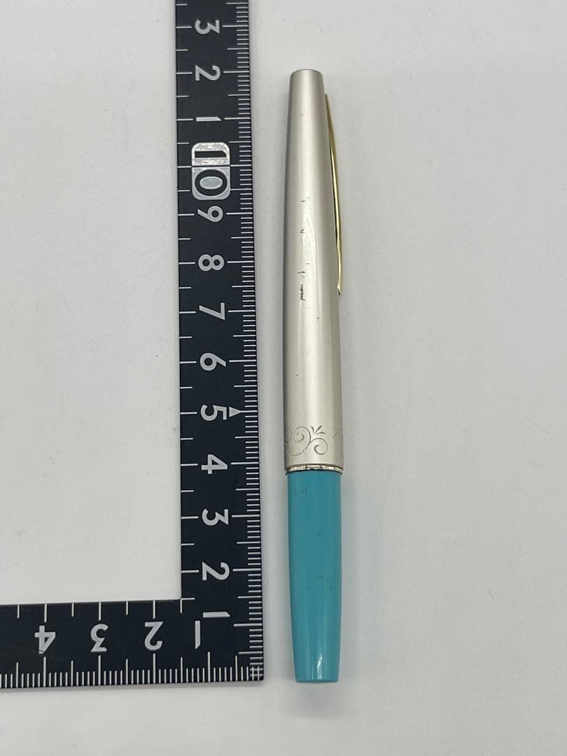 Pilot fountain pen with 14K gold-plated fine nib in turquoise blue and silver etching design