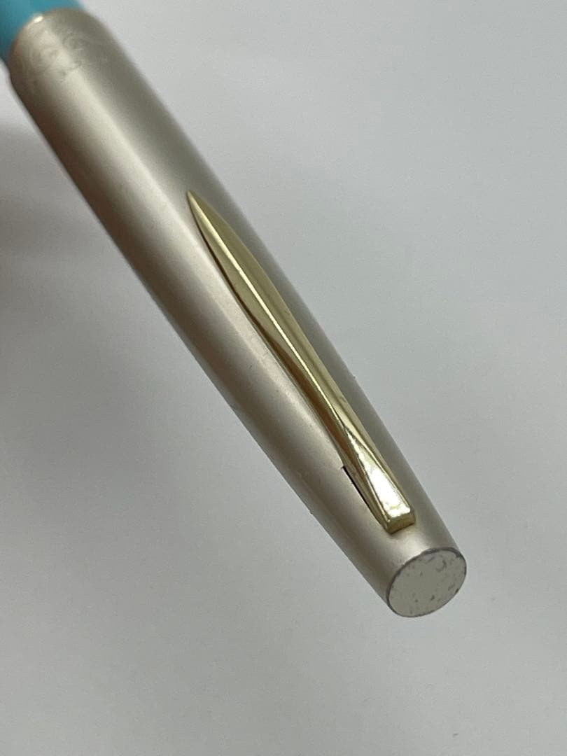 Pilot fountain pen with 14K gold-plated fine nib in turquoise blue and silver etching design