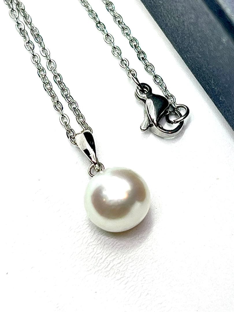 Akoya pearl necklace with 9.8mm large round uncolored pearls and silver stainless steel rhodium chain