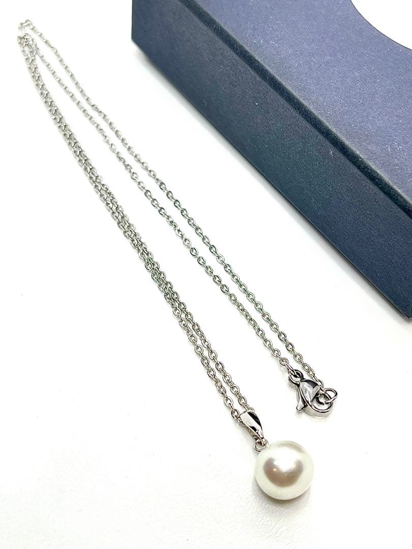 Akoya pearl necklace with 9.8mm large round uncolored pearls and silver stainless steel rhodium chain