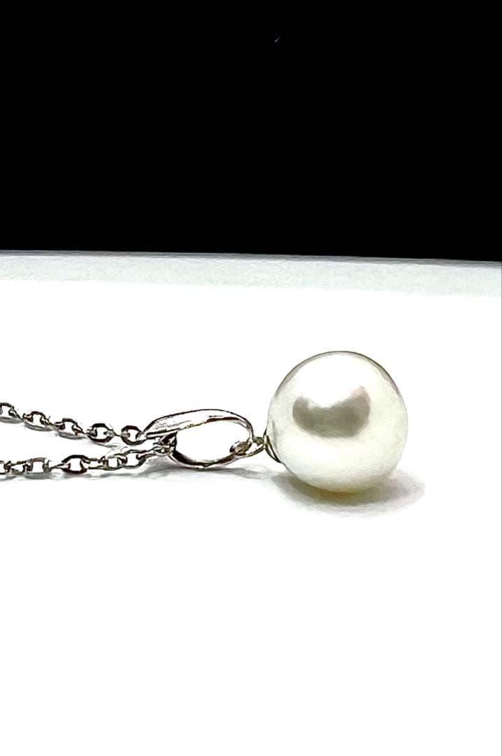 Akoya pearl necklace with 9.8mm large round uncolored pearls and silver stainless steel rhodium chain