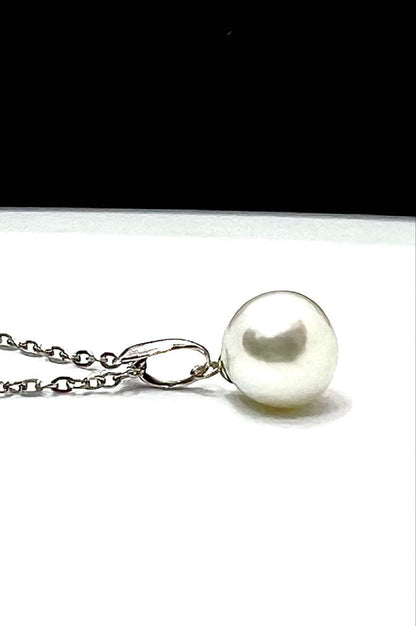 Akoya pearl necklace with 9.8mm large round uncolored pearls and silver stainless steel rhodium chain