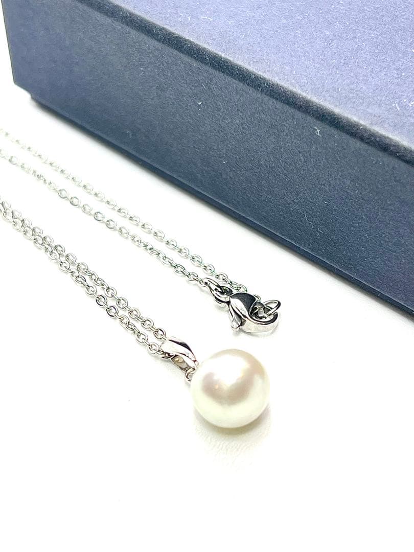 Akoya pearl necklace with 9.8mm large round uncolored pearls and silver stainless steel rhodium chain