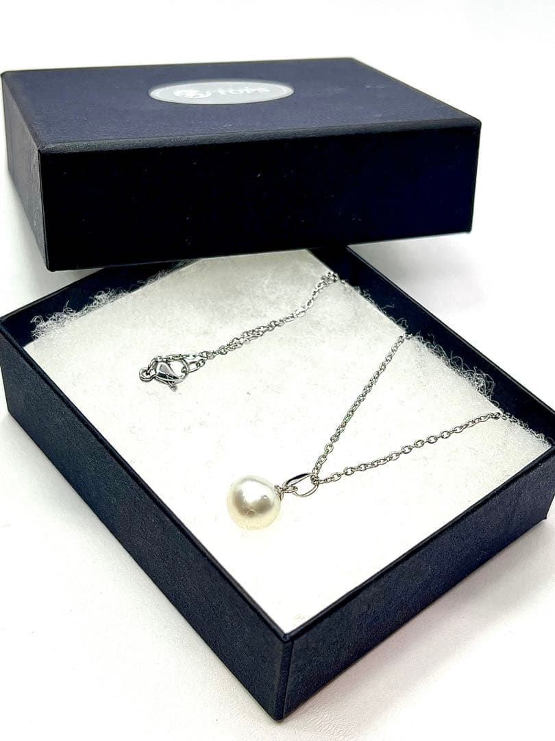 Akoya pearl necklace with 9.8mm large round uncolored pearls and silver stainless steel rhodium chain