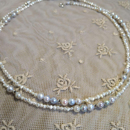 Long necklace with 2.5-3.5mm Akoya Keshi pearls and 5mm natural color Akoya baroque pearls on silver925 chain