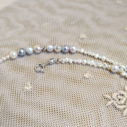 Long necklace with 2.5-3.5mm Akoya Keshi pearls and 5mm natural color Akoya baroque pearls on silver925 chain