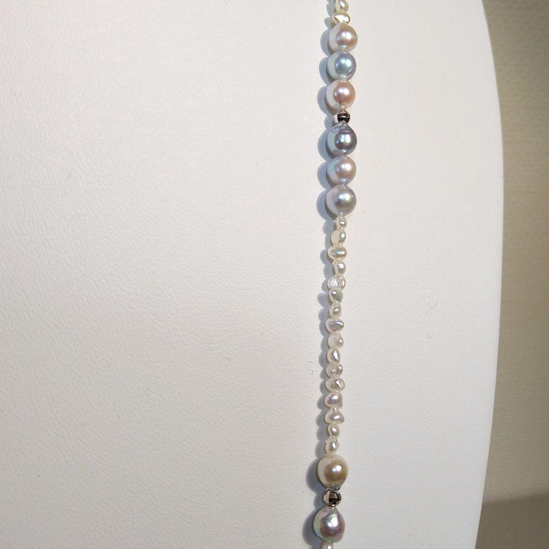 Long necklace with 2.5-3.5mm Akoya Keshi pearls and 5mm natural color Akoya baroque pearls on silver925 chain