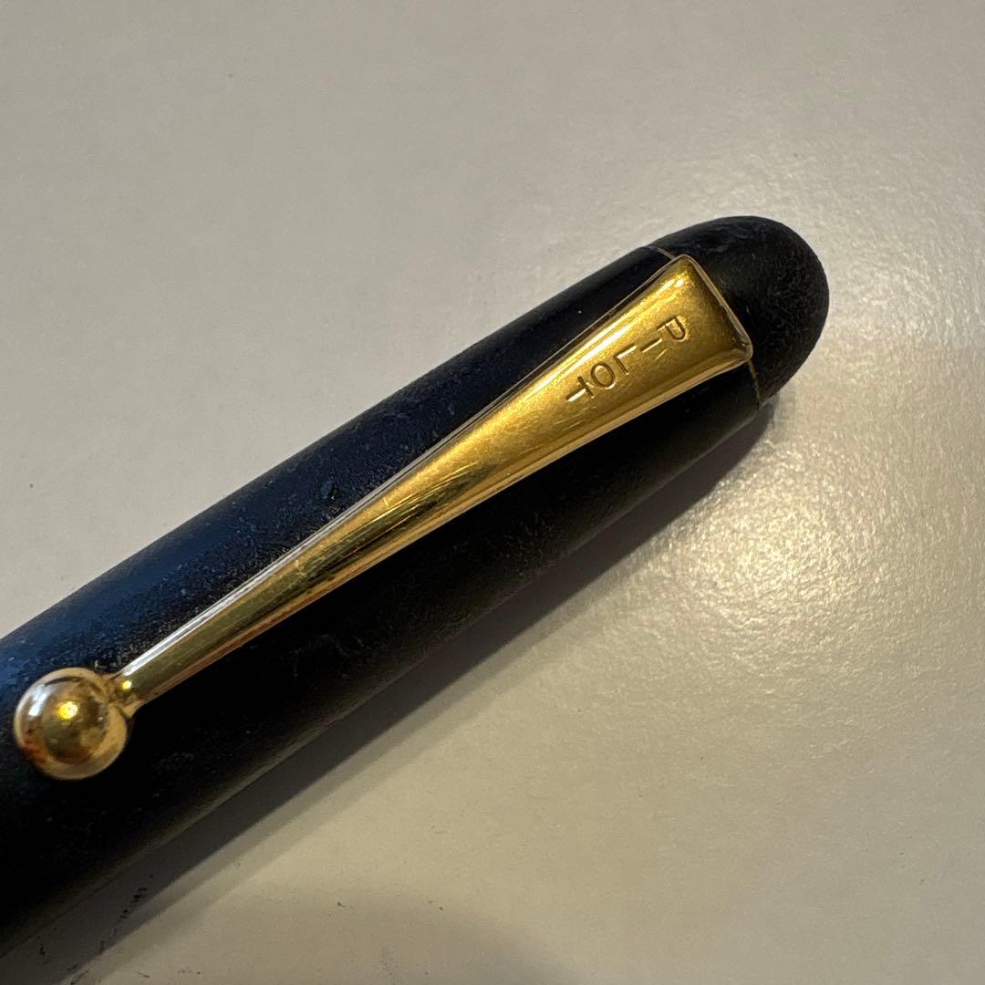 PILOT 14K-585 F vintage fountain pen with gold nib showing retro design and signs of aging