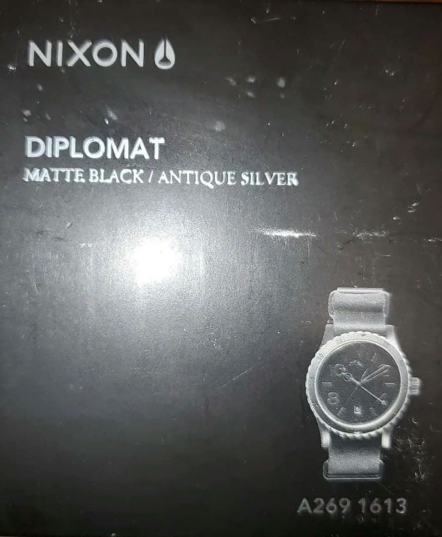 NIXON DIPLOMAT BLACK/ANTIQUE SILVER Quartz Men's Watch — Japanese